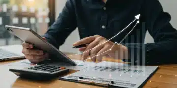 Person analyzing credit score graph on tablet, financial planning