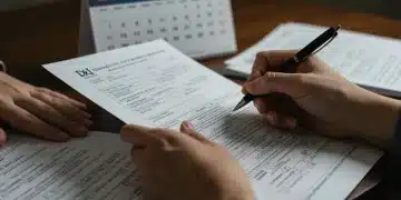 Hands completing disability benefit application forms with a June 2025 deadline highlighted on a calendar.